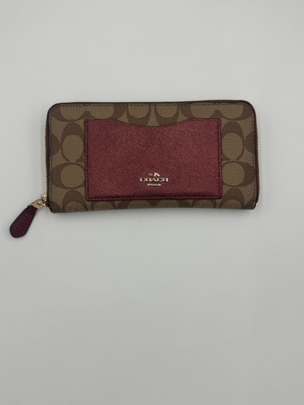 Coach Brown Signature Canvas Zip Wallet with Burgundy Pocket